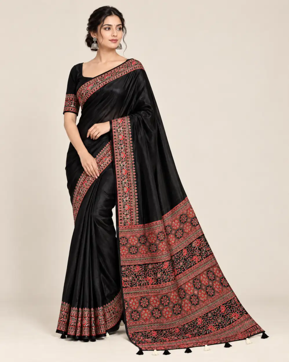 Ajrakh Creap Silk Saree Black main Maroon Ajrakh creap silk saree with printed borders and matching blouse piece.