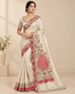 Embroidered satin saree with matching blouse piece shown in cream, teal, and orange-red colourways.